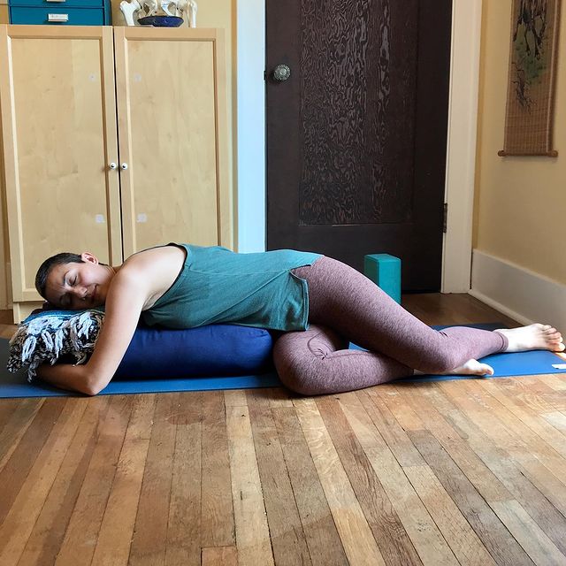Reclining Twist with a Bolster (Supported Bharadvaja Twist Pose) Steps - Sharp Muscle